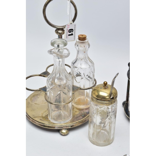 61 - A CUT GLASS THREE BOTTLE DECANTER STAND AND CRUET SET, the white metal decanter set with three cut g... 