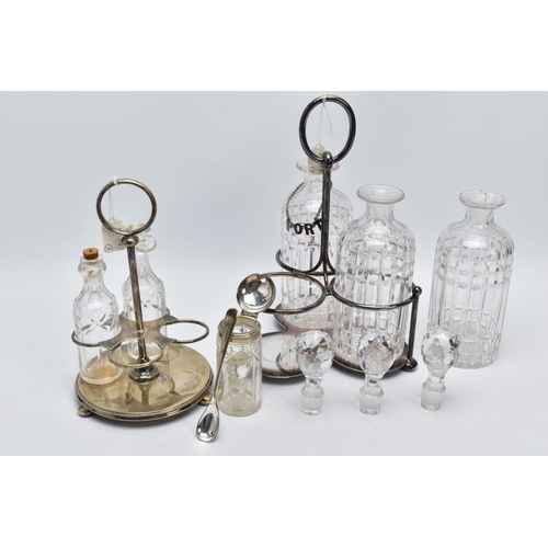 61 - A CUT GLASS THREE BOTTLE DECANTER STAND AND CRUET SET, the white metal decanter set with three cut g... 