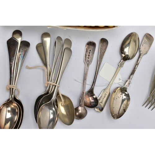 66 - A QUANTITY OF CUTLERY AND A BON BON DISH, to include a William IV silver fiddle sauce ladle with an ... 