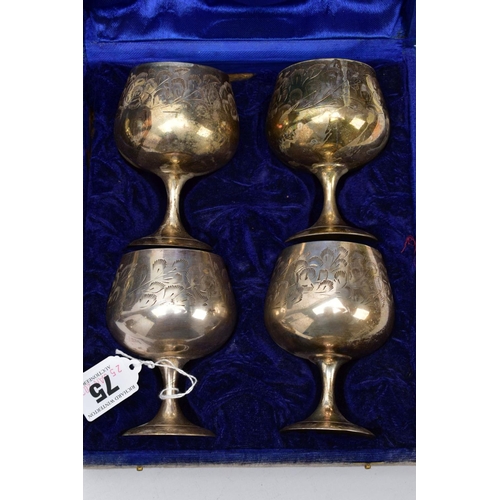 75 - THREE CASED SETS OF WINE AND BRANDY METAL GOBLETS, assorted design each engraved in a foliate and fl... 