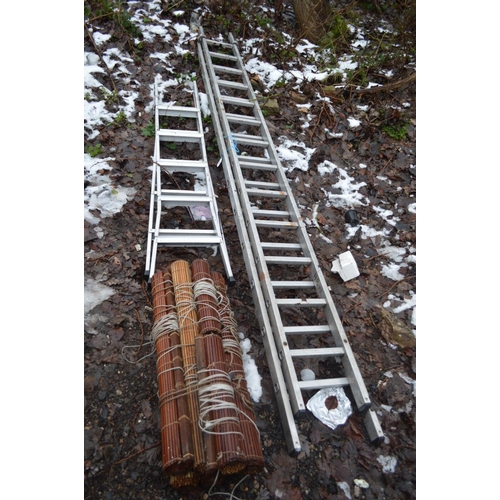 1001 - AN ALUMINIUM EXTENSION LADDER with 13 rungs to each 3.5m section, a step ladder and a bundle of 7 wo... 