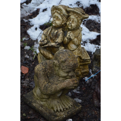 1002 - SIX COMPOSITE GARDEN FIGURES including twins on a bench 50cm high (6)