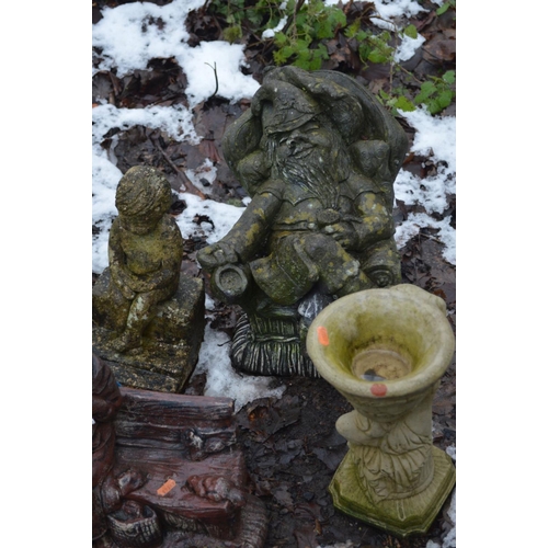 1002 - SIX COMPOSITE GARDEN FIGURES including twins on a bench 50cm high (6)