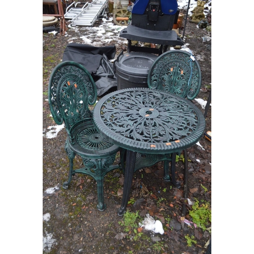 1006 - A PAINTED PLASTIC CIRCULAR GARDEN TABLE ( 68cm in diameter) and two chairs (3)