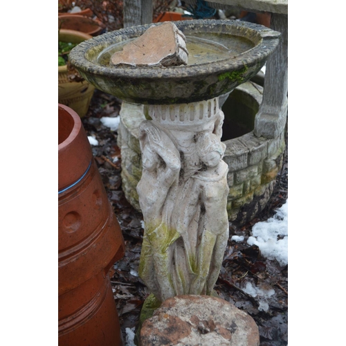 1011 - A TERRACOTTA CHIMNEY POT 65cm high, a Composite birdbath with three ladies forming the base and a ro... 