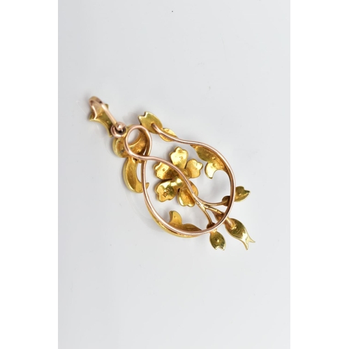 104 - A YELLOW METAL SEED PEARL PENDANT, of an openwork design, featuring a central flower set with a seed... 