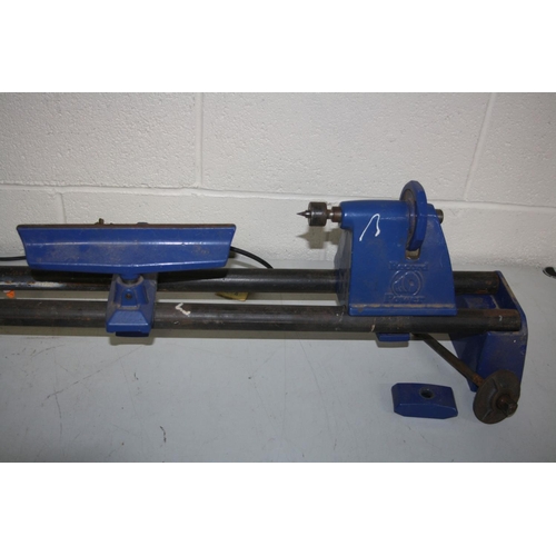 1057 - A RECORD DML24X WOOD LATHE  240 volt 110cm long bed (PAT pass and working)