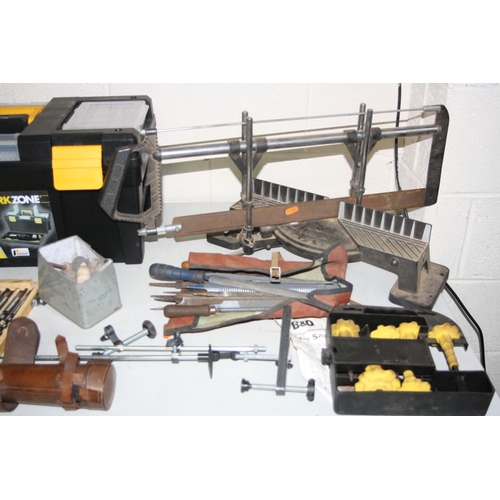 1060 - TWO WORKZONE TOOLBOXES AND A TRAY CONTAINING TOOLS including a mitre saw, chisels, auger bits, spann... 