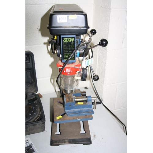 1061 - A POWERCRAFT DP500 PILLAR DRILL , a machine vice and a Powercraft 9 inch angle grinder with spare di... 