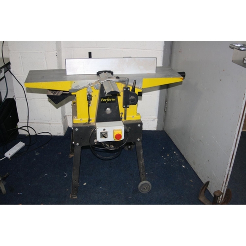 1066 - A PERFORM CCNPT PLANER THICKNESS 240volt with a 10 inch blade width, 103cm long bed, adjustable righ... 