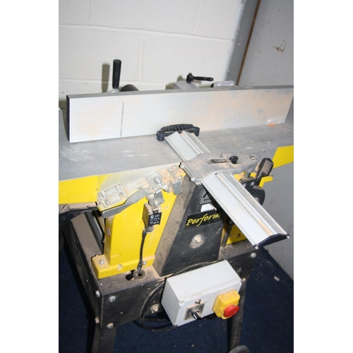 1066 - A PERFORM CCNPT PLANER THICKNESS 240volt with a 10 inch blade width, 103cm long bed, adjustable righ... 