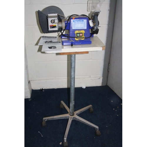 1067 - A CHARNWOOD W406 BENCH GRINDER with a WG200 Wet stone grinder attachment , gouge cutting guide on wh... 