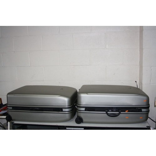 1072 - THREE MARKS AND SPENCER SATELLITE ROLLER SUITCASES, including two 76cm high and one 68cm high (3)