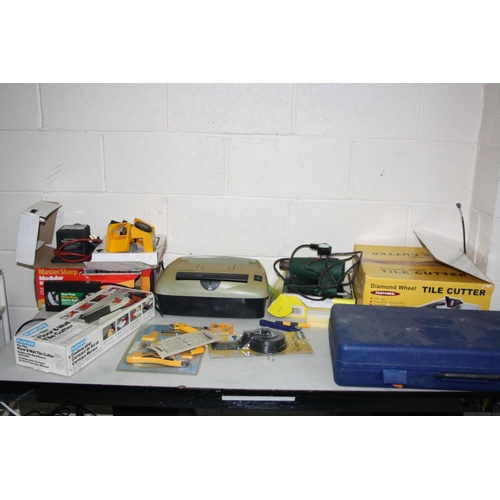 1079 - A BOSCH PHG 2 HEAT GUN, a Plasplugs Modular Sharpening System, a Fellows Paper and Credit Card Shred... 