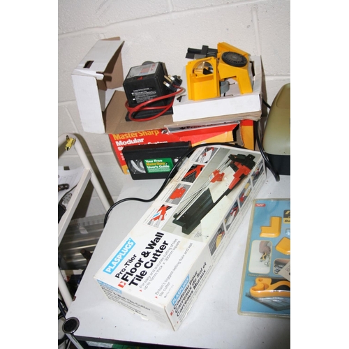 1079 - A BOSCH PHG 2 HEAT GUN, a Plasplugs Modular Sharpening System, a Fellows Paper and Credit Card Shred... 