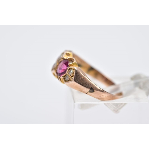 108 - A 9CT GOLD GARNET AND SPLIT PEARL RING, designed with two circular cut garnets, interspaced with thr... 