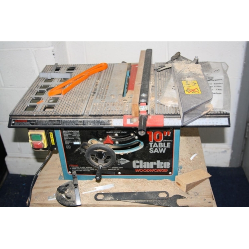 1086 - A CLARKE 10 INCH TABLE SAW mounted to a bespoke plywood stand (PAT pass and working) blade guard rem... 