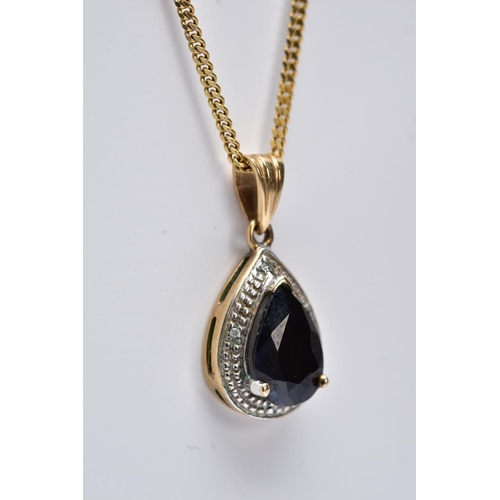 109 - A 9CT GOLD SAPPHIRE AND DIAMOND PENDANT NECKLET, the pendant of a tear-drop shape, set with a pear c... 