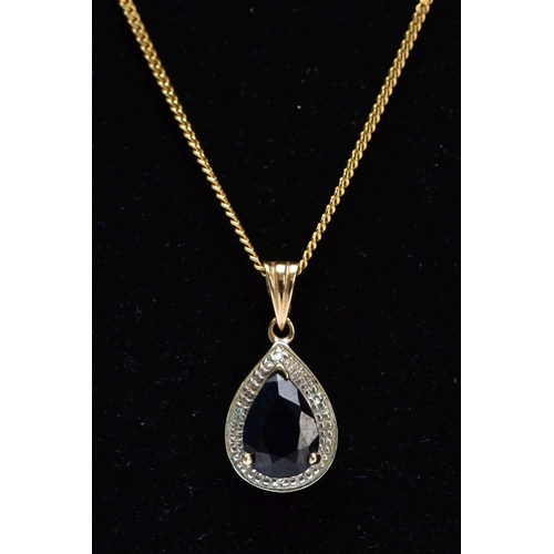 109 - A 9CT GOLD SAPPHIRE AND DIAMOND PENDANT NECKLET, the pendant of a tear-drop shape, set with a pear c... 