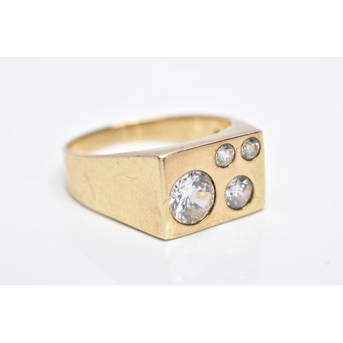 110 - A 9CT GOLD, CUBIC ZIRCONIA SET SIGNET RING, of a rectangular form set with four graduated circular c... 