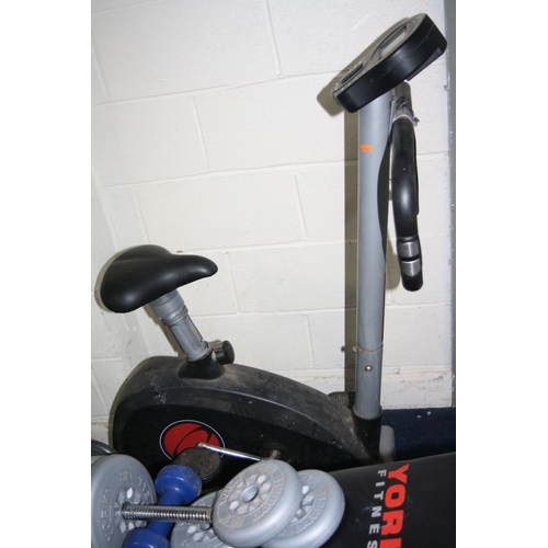 1167 - A QUANTITY OF EXERCISE EQUIPMENT including an Olympus Sport exercise bike (distressed) , a York benc... 