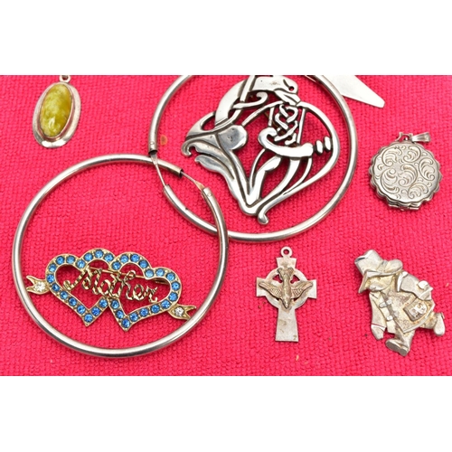 118 - A SELECTION OF SILVER AND WHITE METAL JEWELLERY, to include a heavy silver ring in the form of a sad... 