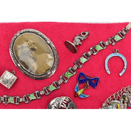 119 - A SELECTION OF SILVER AND WHITE METAL ITEMS, to include two silver ingot pendants with hallmarks for... 