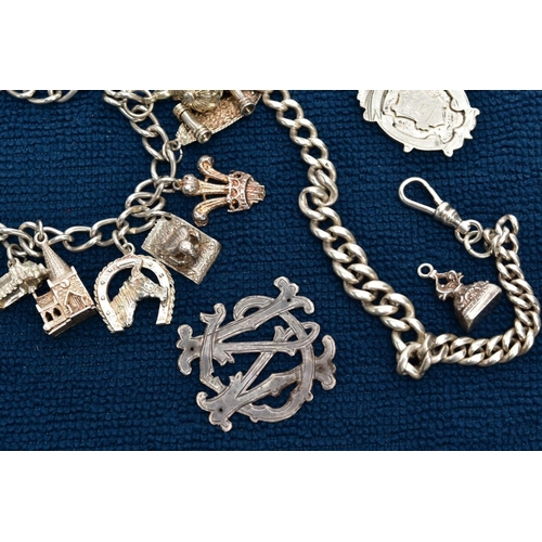 121 - A SELECTION OF SILVER AND WHITE METAL ITEMS, to include a silver charm bracelet suspending thirteen ... 