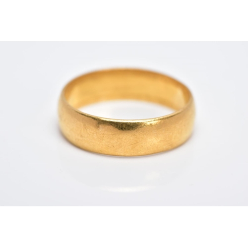 13 - A 22CT GOLD WIDE BAND, of a plain polished design hallmarked 22ct gold London, ring size P½, approxi... 