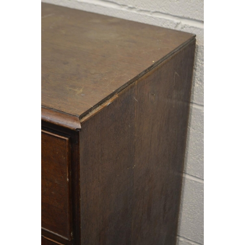 1333 - AN EARLY 20TH CENTURY OAK CHEST OF FOUR SHORT DEEP DRAWERS OVER TWO LONG DRAWERS, with ebonised turn... 