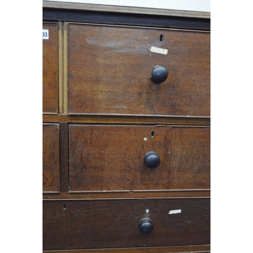 1333 - AN EARLY 20TH CENTURY OAK CHEST OF FOUR SHORT DEEP DRAWERS OVER TWO LONG DRAWERS, with ebonised turn... 