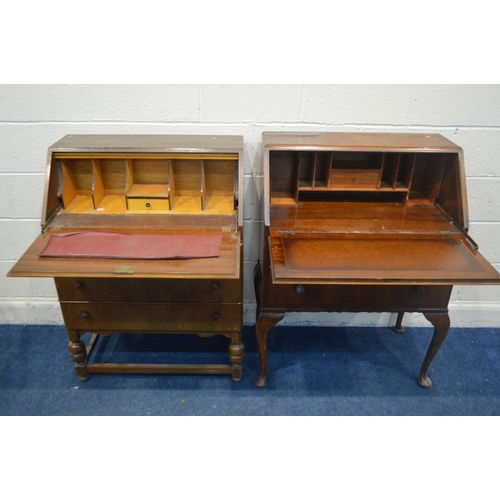 1335 - AN OAK BUREAU and a walnut bureau (2)