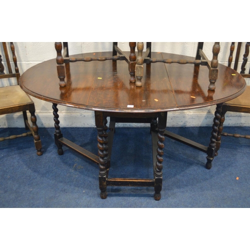 1351 - AN EARLY TO MID 20TH CENTURY OAK BARLEY TWIST GATE LEG TABLE (sd) four similar chairs and another ch... 