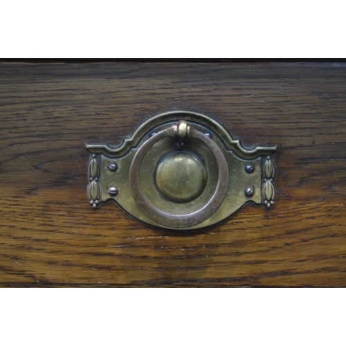 1396 - AN EARLY 20TH CENTURY OAK CUPBOARD, with a raised back, with a single drawer above a single cupboard... 