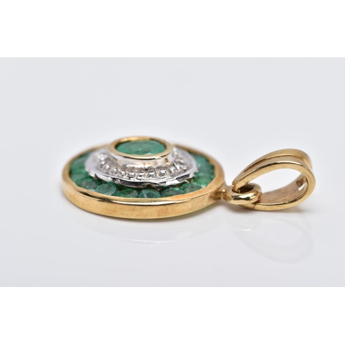 23 - A 9CT GOLD EMERALD AND DIAMOND PENDANT, of an oval form set with a central oval cut emerald within a... 