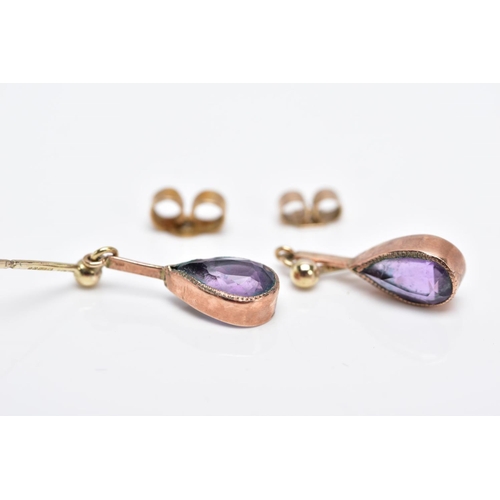 24 - A PAIR OF 9CT GOLD AMETHYST DROP EARRINGS, each designed with a pear cut amethyst within a collet mo... 