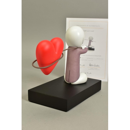 324 - DOUG HYDE (BRITISH 1972) 'CAUGHT UP IN LOVE' a limited edition sculpture of a figure carrying a net ... 