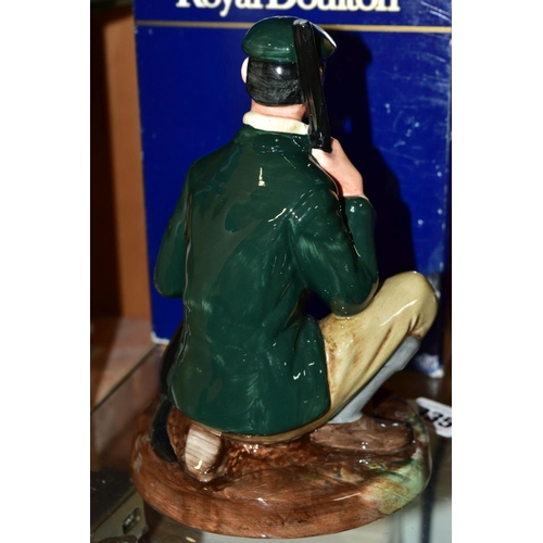 335 - A BOXED ROYAL DOULTON FIGURE 'The Gamekeeper' HN2879