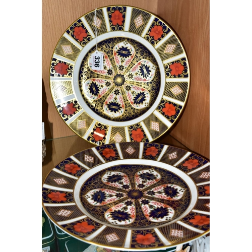 336 - A PAIR OF ROYAL CROWN DERBY 1128 IMARI PATTERN 27CM DINNER PLATES, both marked as seconds, both with... 