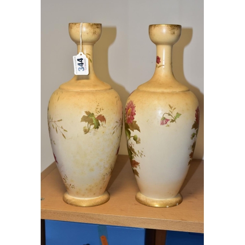 344 - A PAIR OF WILTSHAW & ROBINSON (LTD) CARLTON WORKS IVORY GROUND BALUSTER VASES, printed and painted w... 