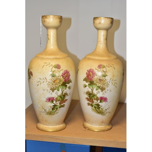 344 - A PAIR OF WILTSHAW & ROBINSON (LTD) CARLTON WORKS IVORY GROUND BALUSTER VASES, printed and painted w... 