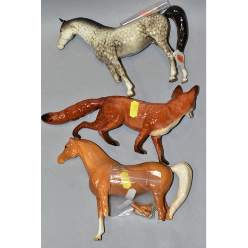 350 - TWO BESWICK ARAB 'XAYAL' HORSES, No.1265, rocking horse grey (one leg loose, ears rough), and palomi... 