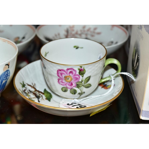 379 - A SMALL GROUP OF ORIENTAL AND CONTINENTAL PORCELAIN, including a Herend cabinet cup and saucer, hand... 