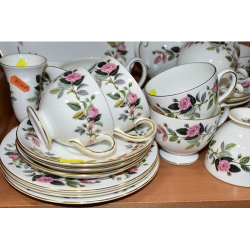 401 - WEDGWOOD 'HATHAWAY ROSE', R4317, comprising cake plate, milk jug, covered twin  handled sugar bowl, ... 