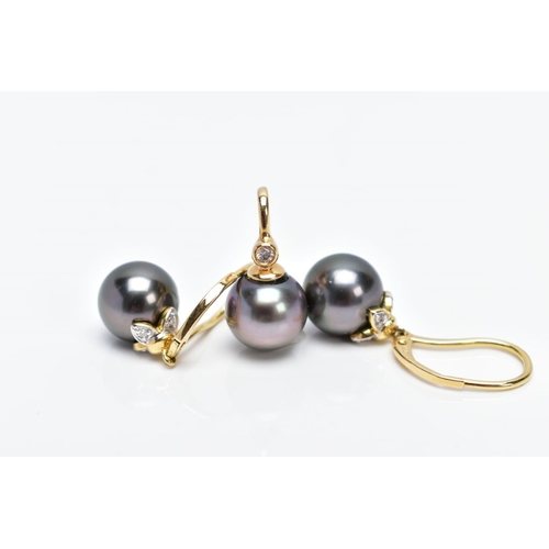 42 - A PAIR OF YELLOW METAL PEARL AND DIAMOND SET EARRINGS AND MATCHING PENDANT, each earring designed wi... 