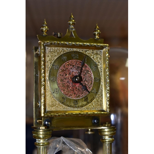 427 - A MID 20TH CENTURY BRASS ANNIVERSARY CLOCK, pendulum loose, mounted on a circular oak base and with ... 