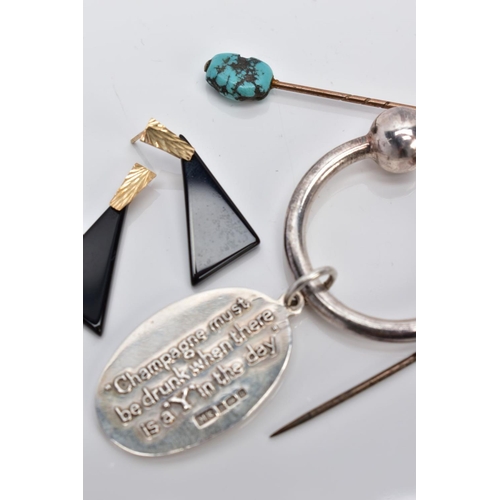 43 - A GOLD RUBY TOPPED STICK PIN, A TURQUOISE STICK PIN, A SILVER KEYRING AND A PAIR OF EARRINGS, the fi... 