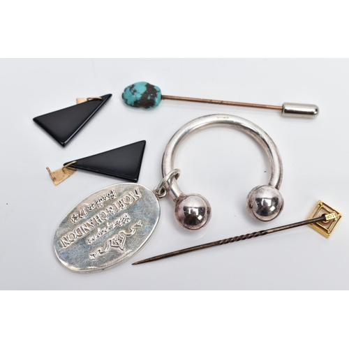 43 - A GOLD RUBY TOPPED STICK PIN, A TURQUOISE STICK PIN, A SILVER KEYRING AND A PAIR OF EARRINGS, the fi... 