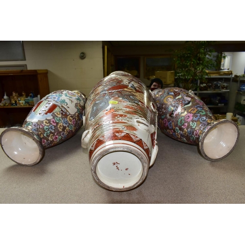 443 - A PAIR OF JAPANESE SATSUMA BALUSTER SHAPED VASES WITH TWIN HANDLES, polychrome decoration depicting ... 