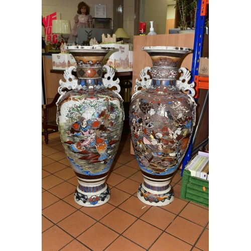 452 - A PAIR OF LARGE FLOORSTANDING BALUSTER SHAPED SATSUMA VASES, polychrome enamel decoration depicting ... 